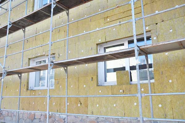 showing a building having exterior wall insulation fitted